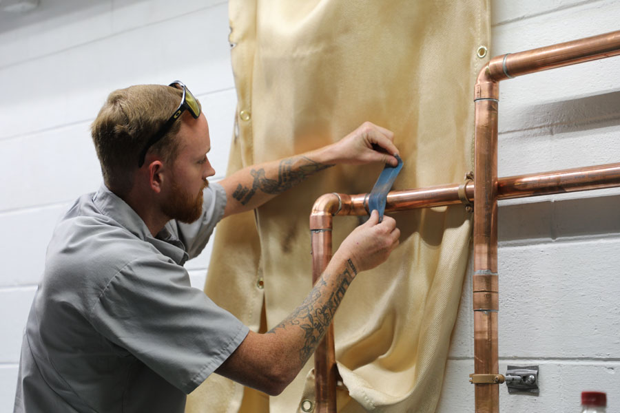 Plumber Repairing Sink in Denison, TX